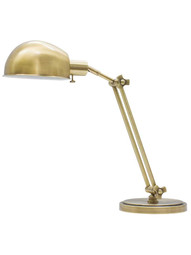 Addison Pharmacy-Style Adjustable Desk Lamp in Antique Brass.